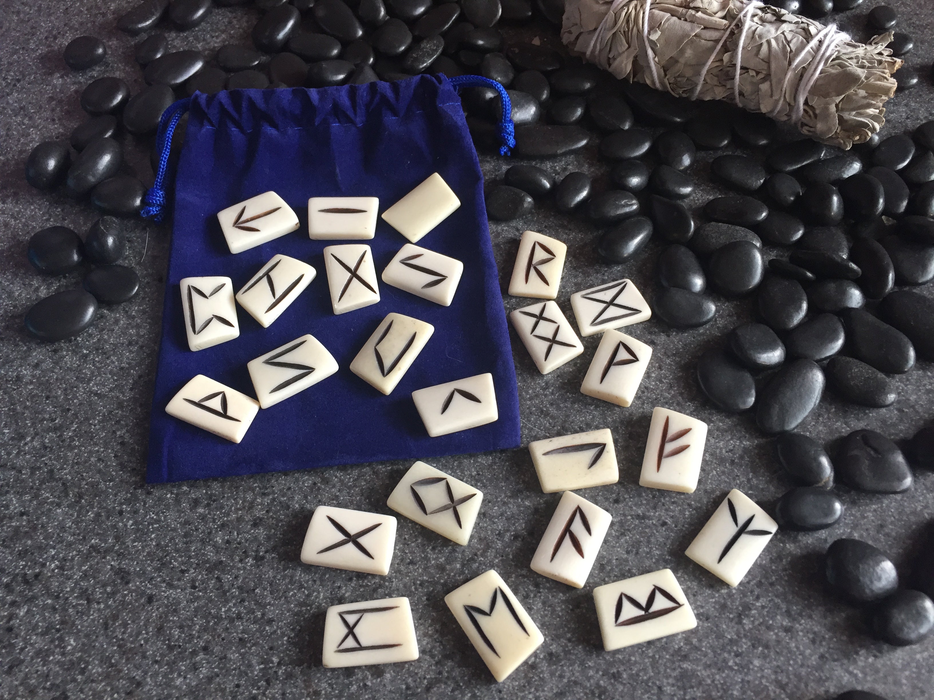 Set of 25 Elder Furthark bone runes - natural bobcat hot toes